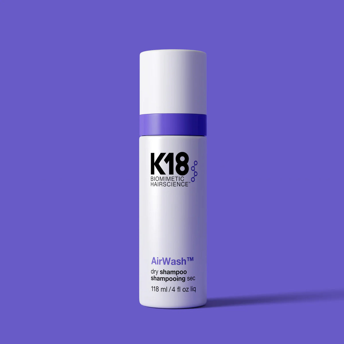 K18 AirWash Dry Shampoo bottle with 118ml capacity, featuring sleek packaging and nozzle for easy application.