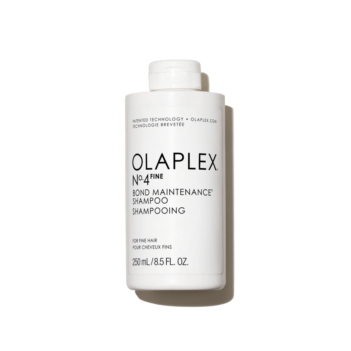 Olaplex No.4 Fine Bond Maintenance Shampoo 250ml bottle with black and white label and pump dispenser for damaged hair.